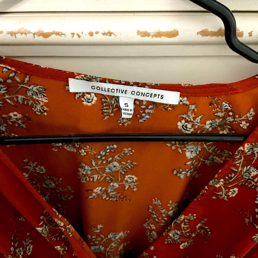 Orange floral blouse